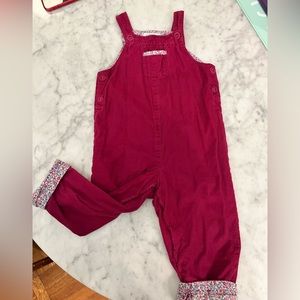 JoJo Maman Bebe corduroy overalls with floral and button detailing.